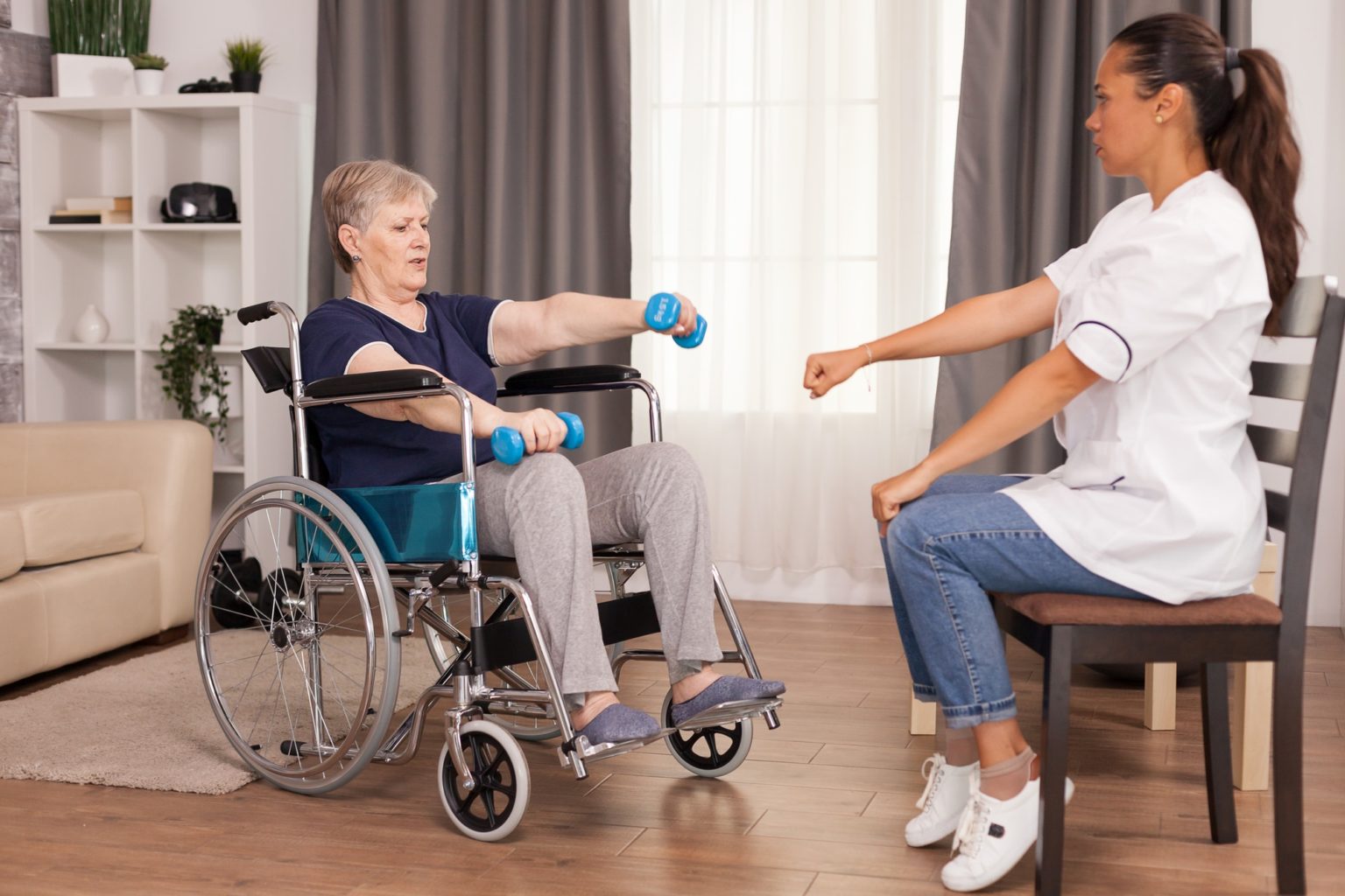 Rehabilitation for old woman in wheelchair